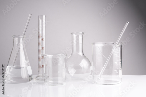 Laboratory glassware on table, Symbolic of science research.