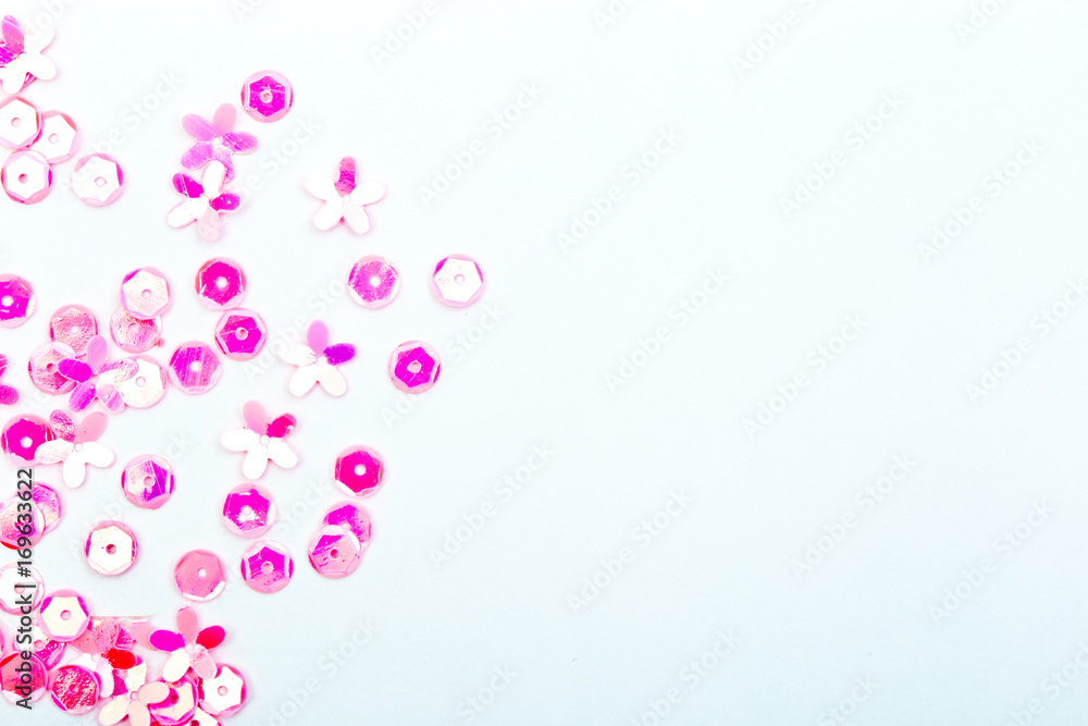 Abstract Background - close up of pink sequins on white background Abstract Background - close up of pink sequins on white background