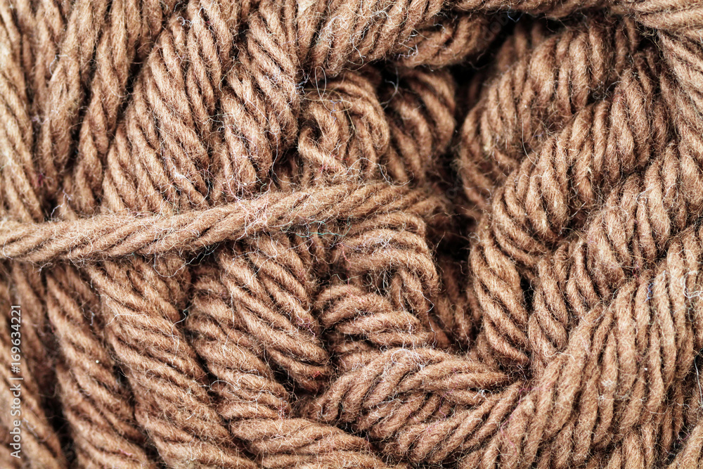 A super close up image of brown yarn A super close up image of brown yarn