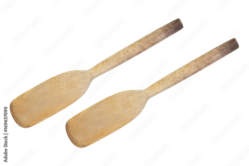 two old cooking wood paddles isolated on white two old cooking wood paddles isolated on white