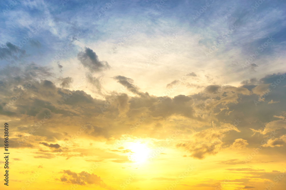 Sky background at sunset,Sky blue and orange light of the sun through the  clouds in the sky survive Stock Photo | Adobe Stock