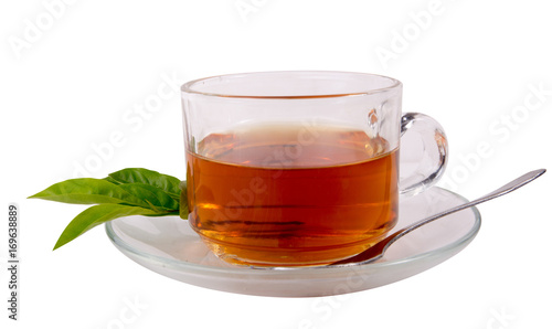 cup with tea and green leaf