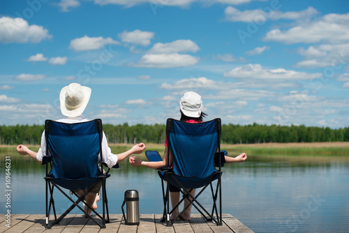 Camping on the river with a loved one, fishing