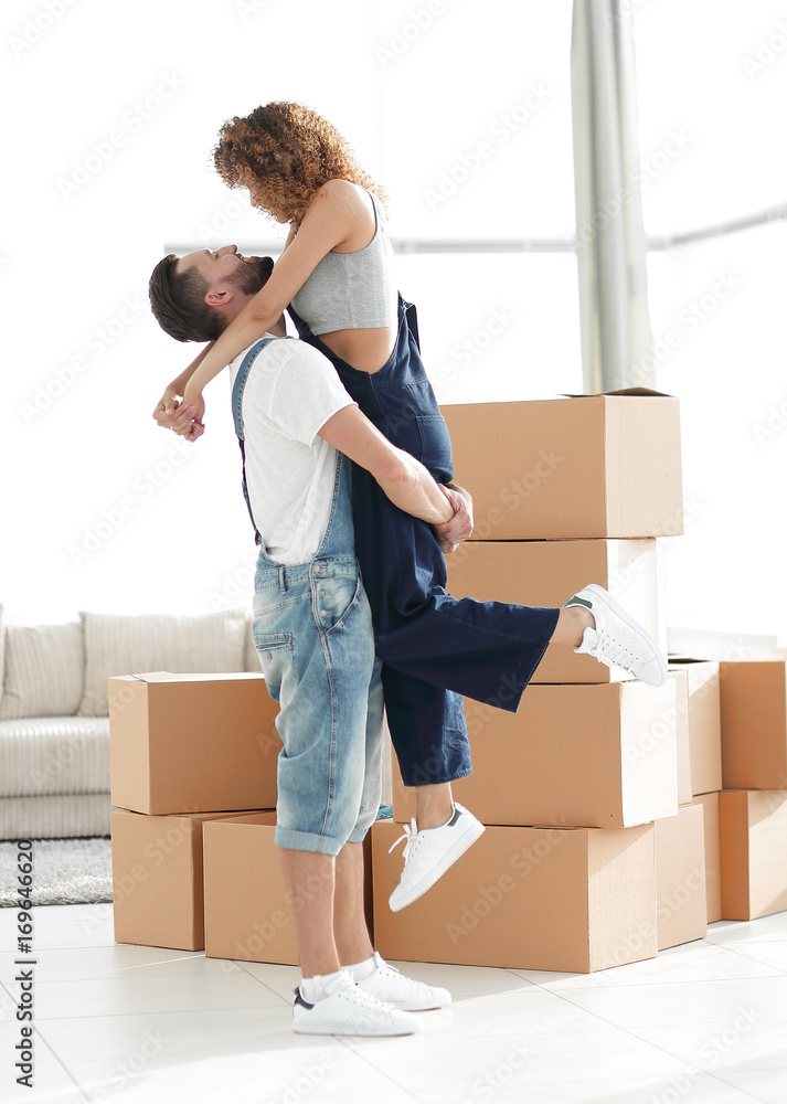 Portrait of a happy couple moving to a new house Portrait of a happy couple moving to a new house
