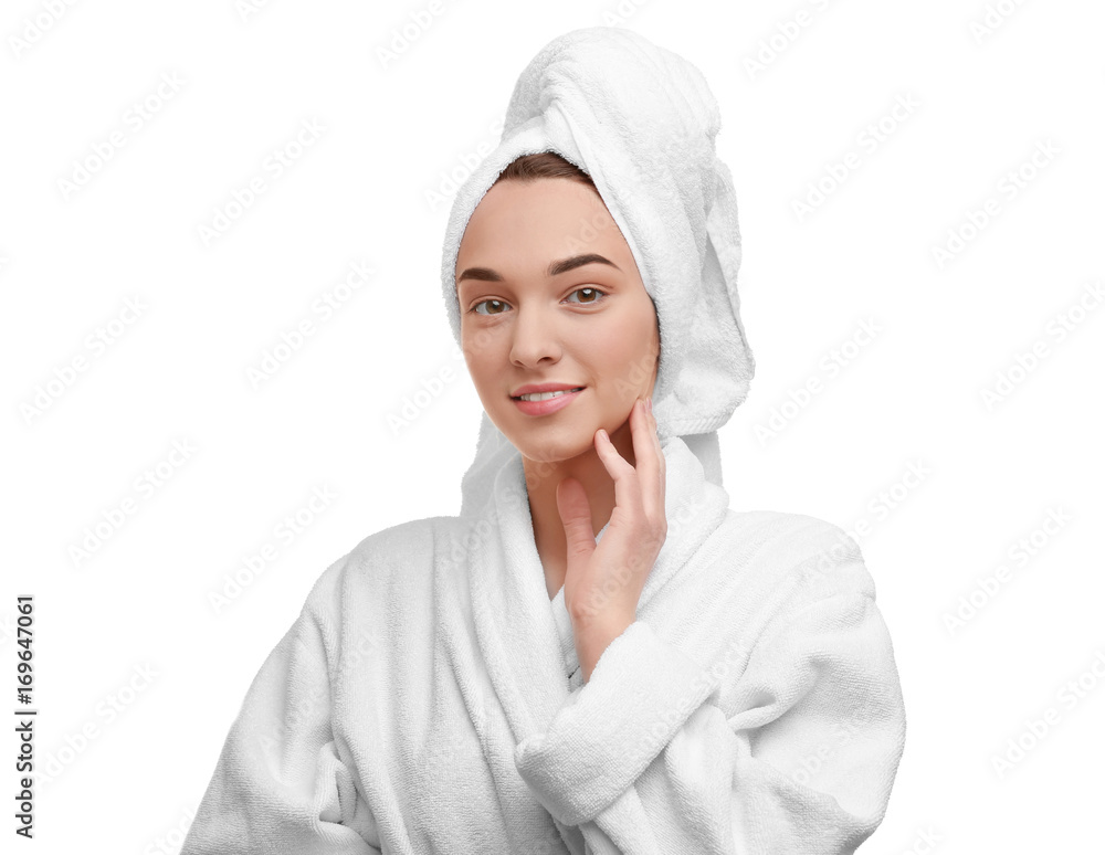 Beautiful young woman in bathrobe after shower on white background Beautiful young woman in bathrobe after shower on white background