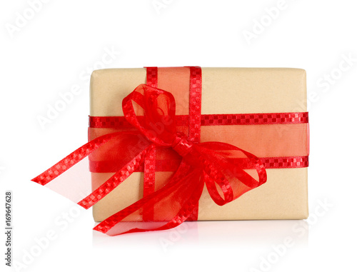 Gift box with red ribbon on white background. Christmas concept
