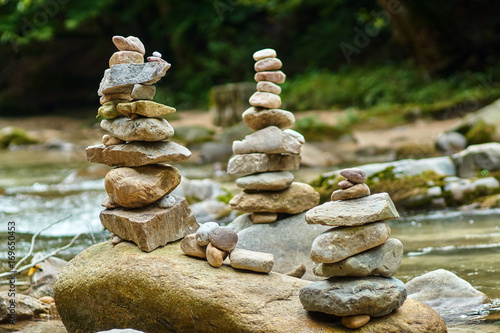 Stones arranged zen-like by the river