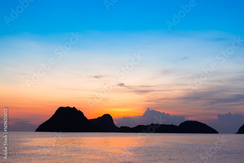 Bright colors at dawn on the beach at sunrise in the Gulf of Thailand.