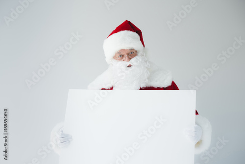 santa with blank banner © LIGHTFIELD STUDIOS