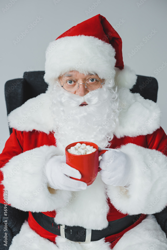 santa drinking hot chocolate with marshmallows santa drinking hot chocolate with marshmallows