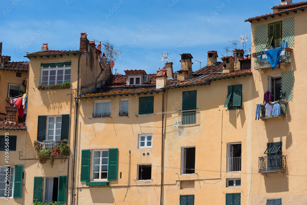 Historic buildings at the Piazza del Anfiteatro in Lucca, Tuscany, Italy