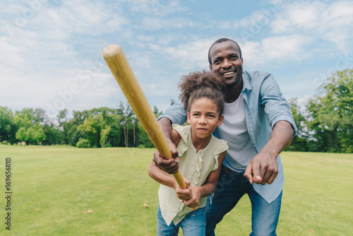Wall Mural african american family playing baseball