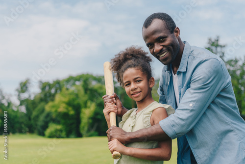 Photography african american family playing baseball