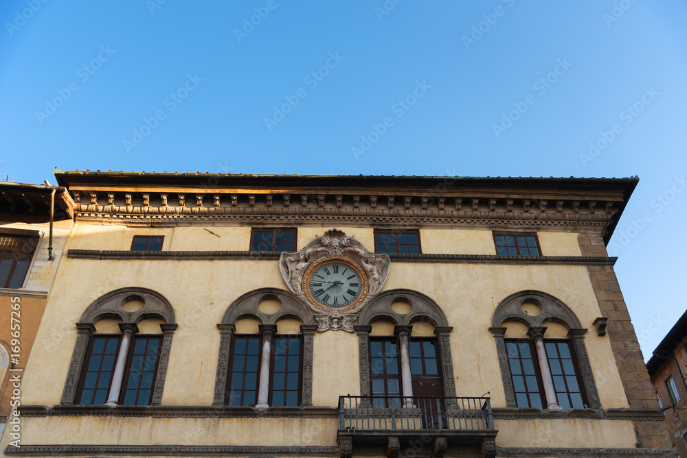 Details of the exterior of typical Italian buildings in Lucca, Tuscany, Italy.