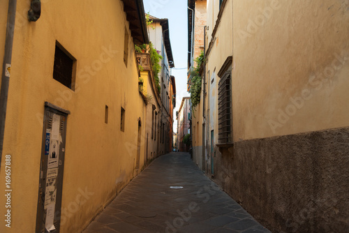 Narrow old cozy street in Lucca  Italy. Lucca is a city and comune in Tuscany. It is the capital of the Province of Lucca