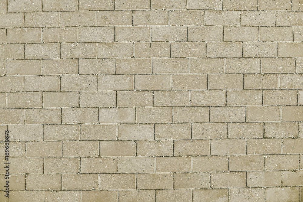 Obraz premium Old beige stone pavementl background texture