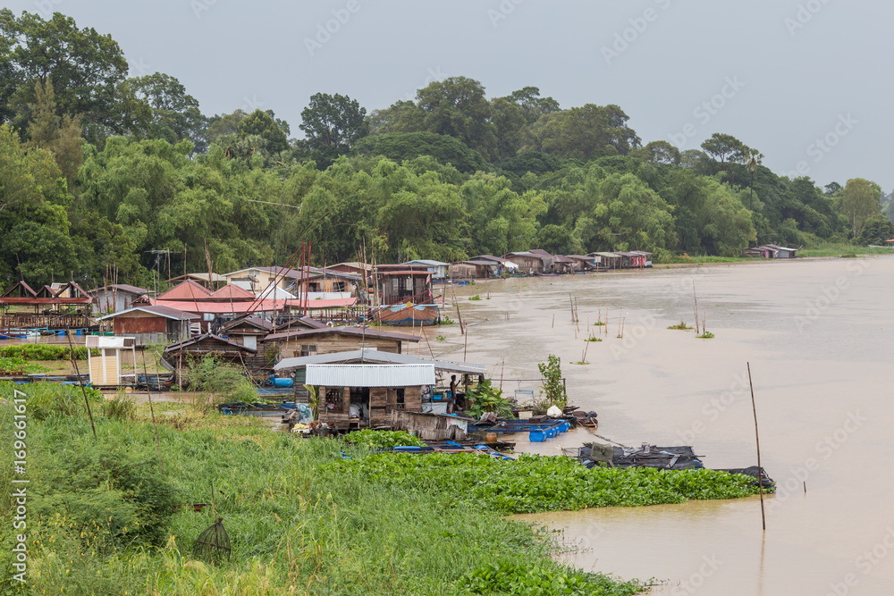 Floating house community on Sa-Kae-Krung river,Uthaithani Province,Thailand.