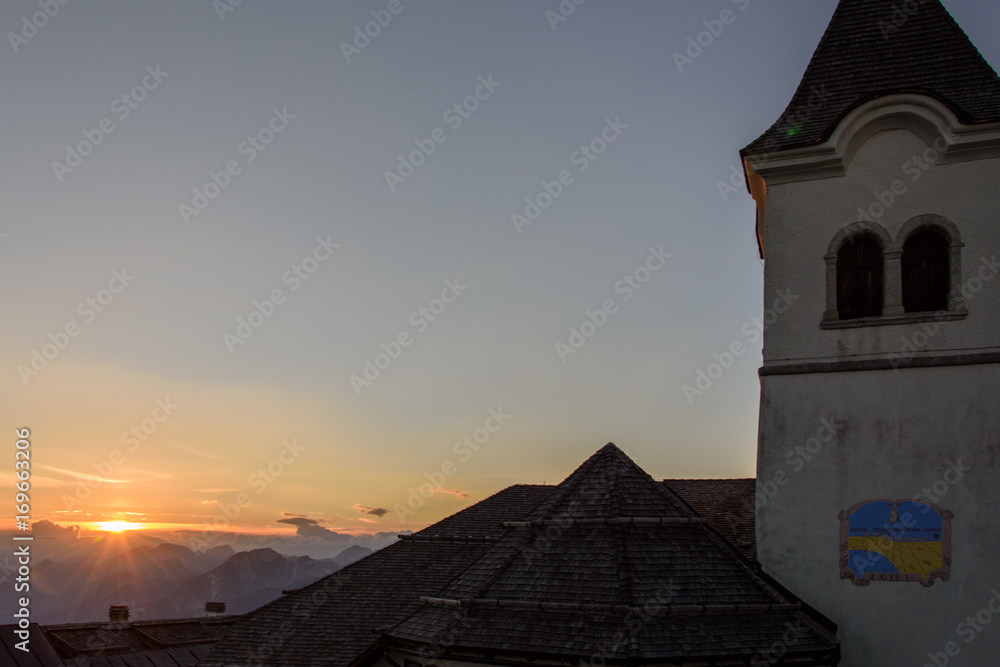 Mountain escape. Panorama from Mount Lussari at sunset Mountain escape. Panorama from Mount Lussari at sunset