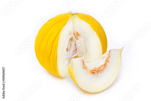 Ripe yellow casaba melon with a slice on white background.
