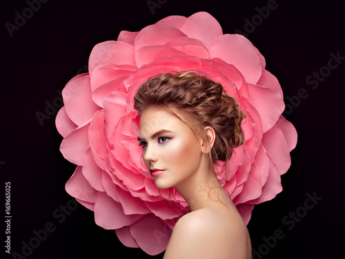 Beautiful woman on the background of a large flower. Beauty summer model girl...