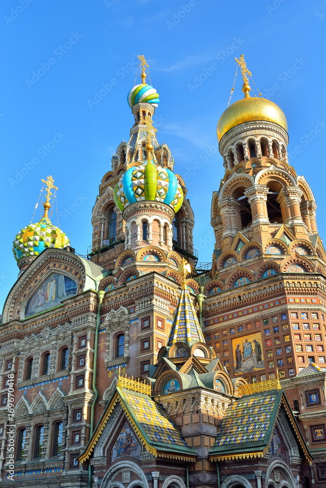 Church of the Savior on spilled Blood illuminated by the sun against the blue sky