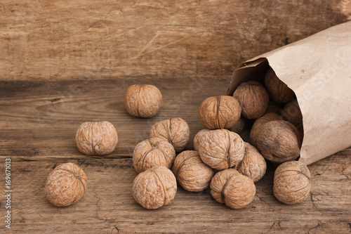 walnuts in a kraft paper bag