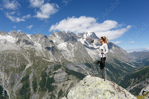 Hiker woman and mountain panorama