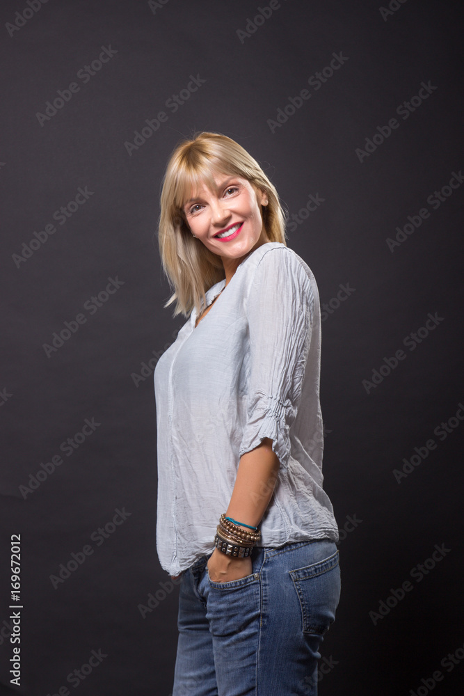 cheerful mature woman 40s casual clothes shirt jeans Photos | Adobe Stock