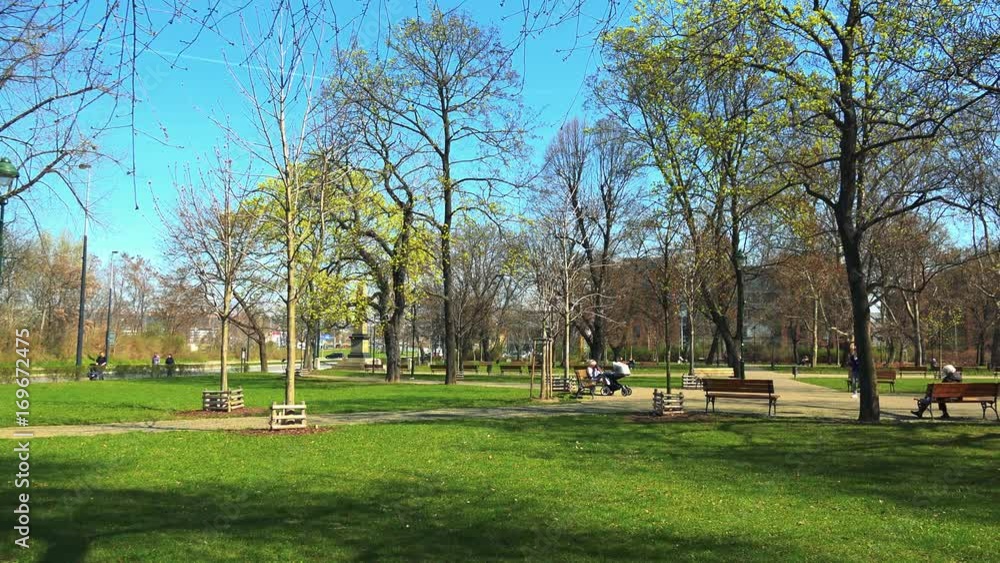 A beautiful green park on a sunny day A beautiful green park on a sunny day