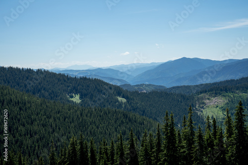 View of Pietrele Doamnei montain (Lady's stones cliff) from the valley. Rarau mountains in Bucovina, Romania