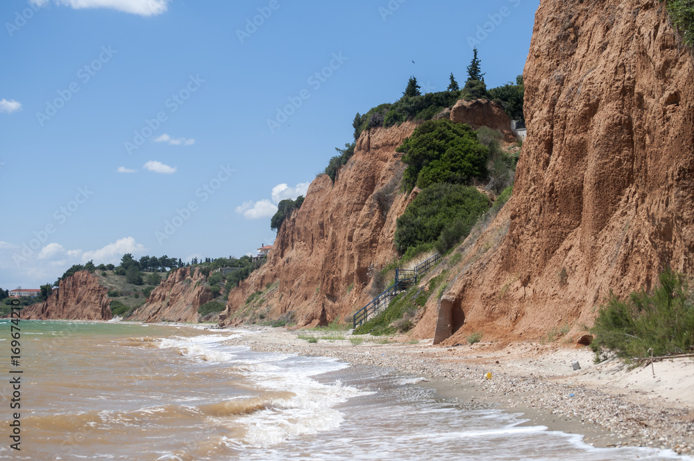 Fototapeta premium Effects of seaside coastal erosion with clayey soil