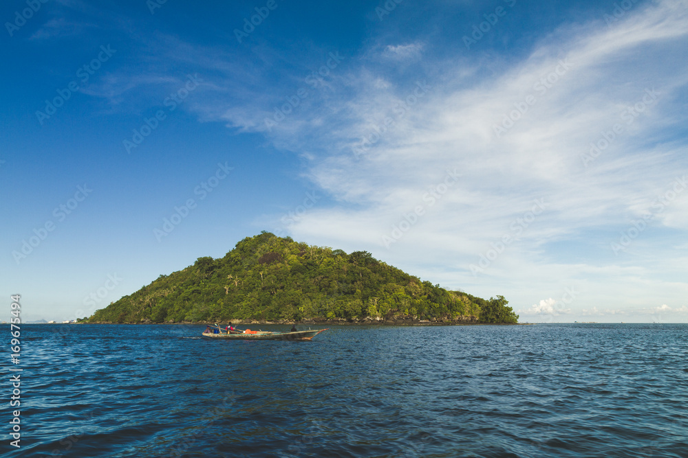 Island with blue sea and blue sky