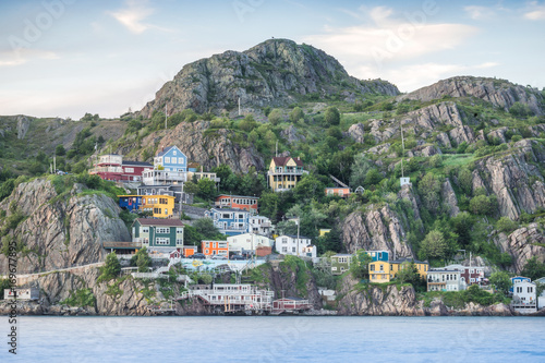 Canvas Print Wooden residential house built on steep hills of St