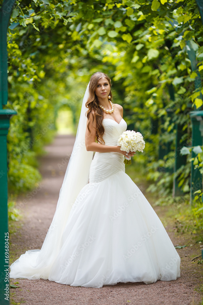 Charming bride in the park
