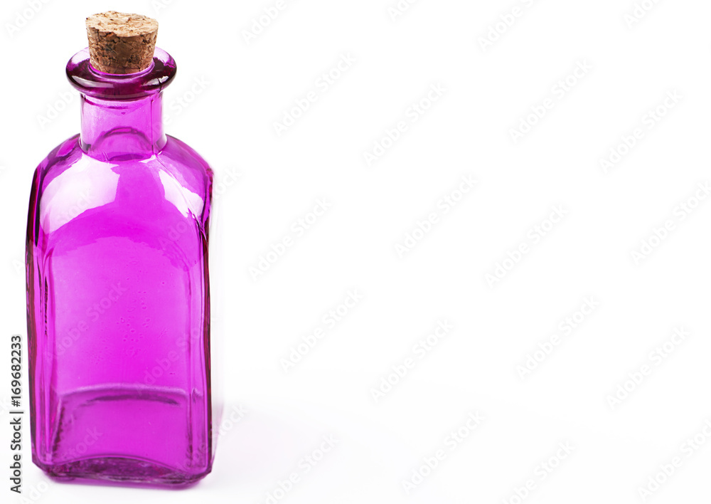 Glass jar of lilac color on white background. Isolated. Container. Copy space. Glass jar of lilac color on white background. Isolated. Container. Copy space.