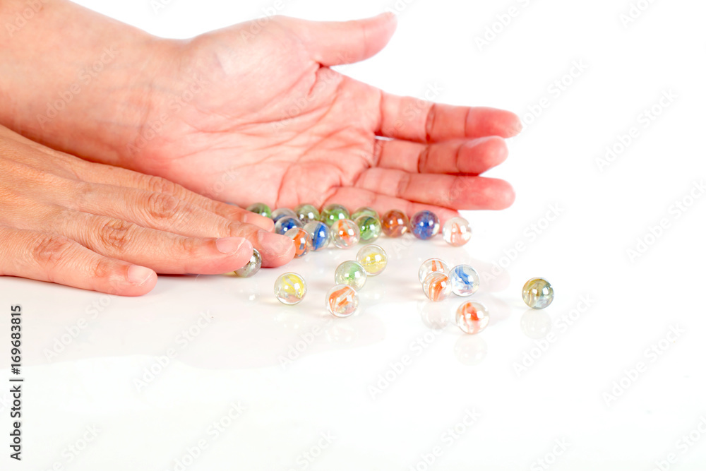 glass marbles balls on white background ,selective focus glass marbles balls on white background ,selective focus