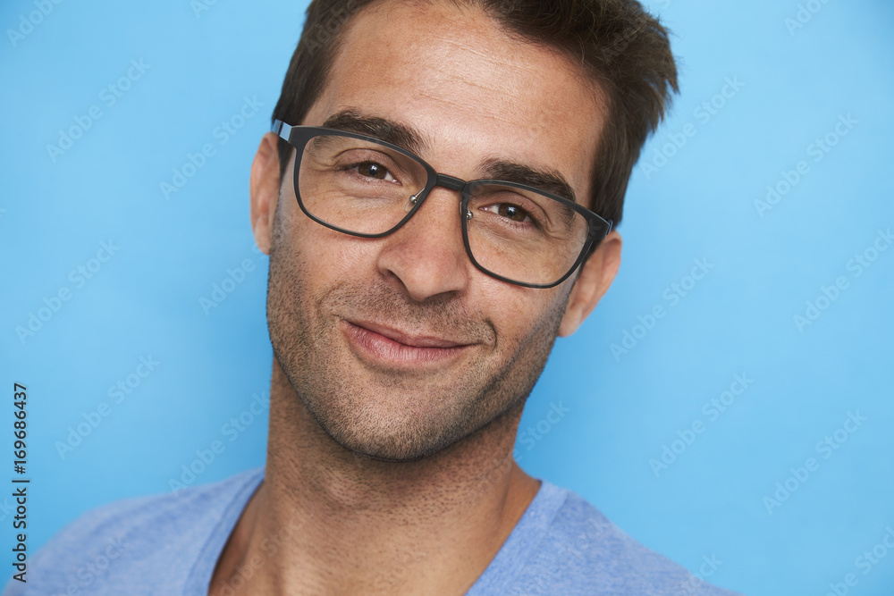 Handsome man in spectacles looking at camera Handsome man in spectacles looking at camera
