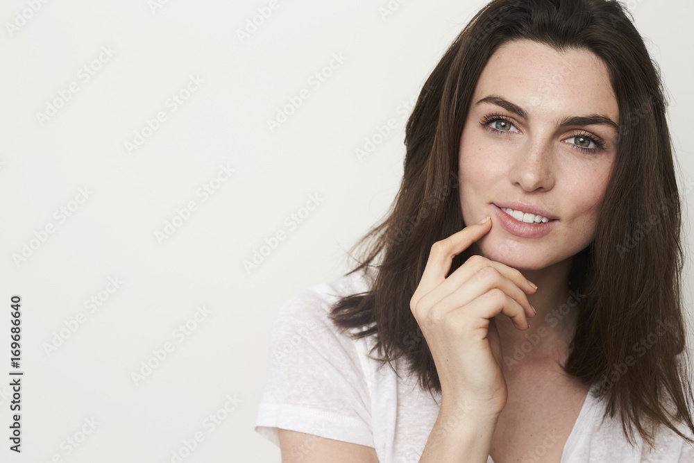 Gorgeous green eyed babe smiling to camera Gorgeous green eyed babe smiling to camera