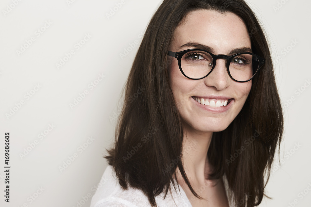Fototapeta premium Portrait of gorgeous girl in glasses, studio