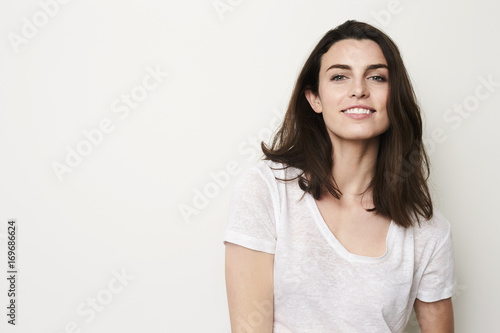 Beautiful girl with beautiful smile in studio  portrait