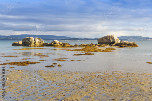 Camaxe rocky islet photo