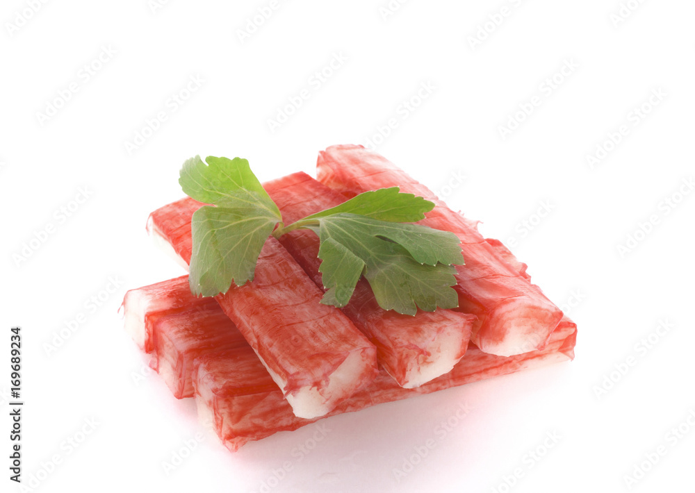 Crab sticks group and rucola leaf isolated on white background Crab sticks group and rucola leaf isolated on white background
