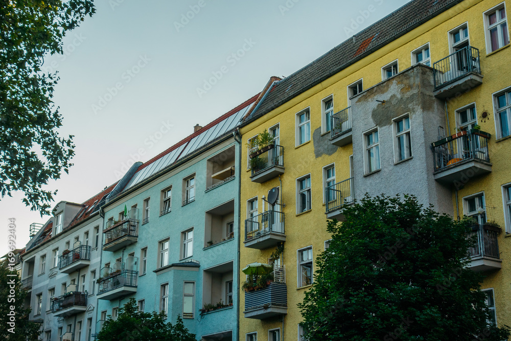 green and yellow apartment complex