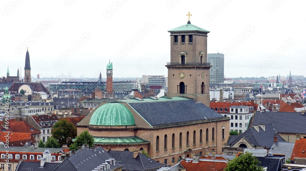 Church of Our Lady, aerial view from the platform at the top of the Rundetaarn or Round Tower in old town, cloudy weather, Copenhagen, Denmark