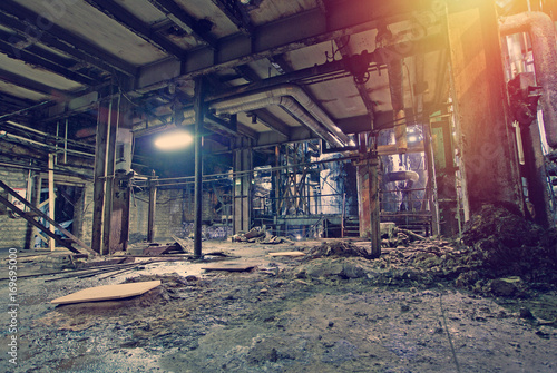 Old creepy, dark, decaying, destructive, dirty factory