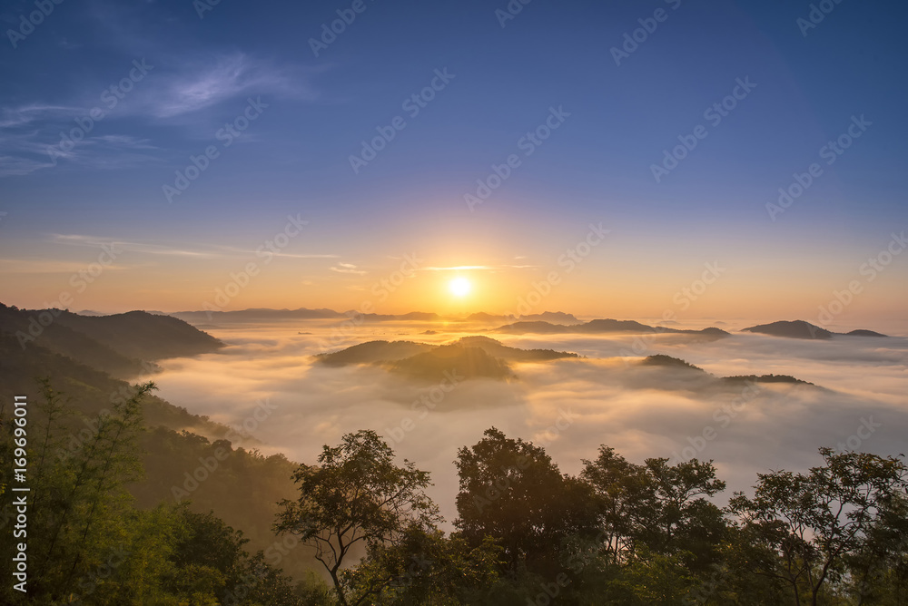 Beautiful sunrise and mist on Mountain landscape background