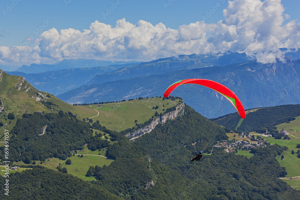 Φωτογραφία Paragliding above gorgeous mountain Garda Lake near Riva del Garda, start is fro