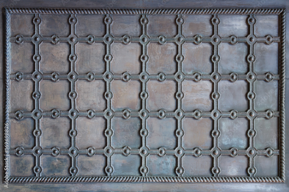 Φωτογραφία Detail of medieval black door with metal decoration of orthodox church