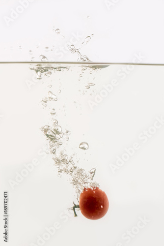 Vegetables throwing into the water