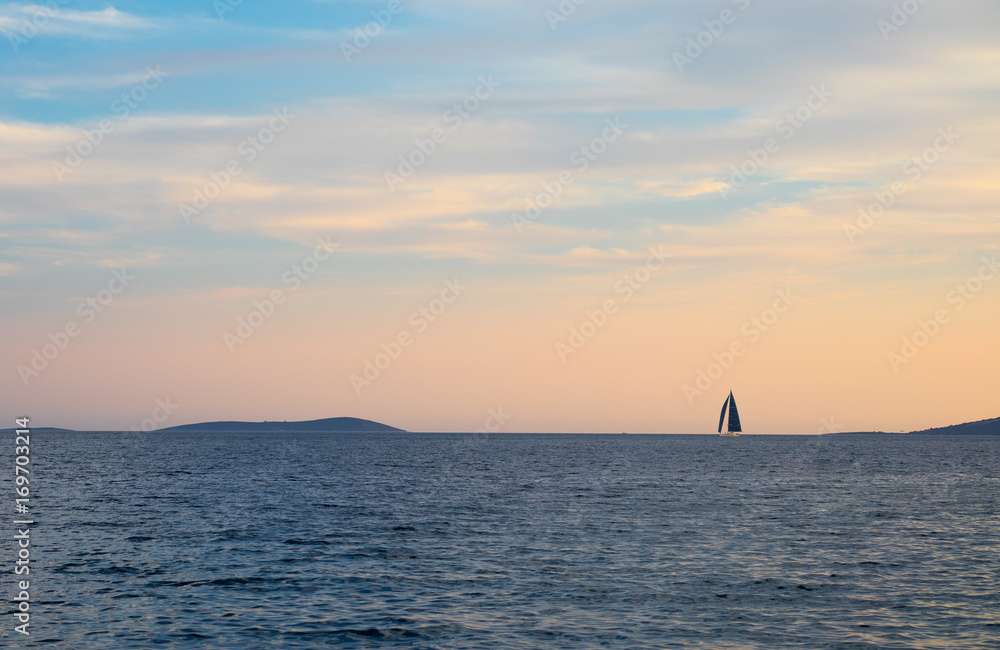 Yacht in Adriatic sea at sunset